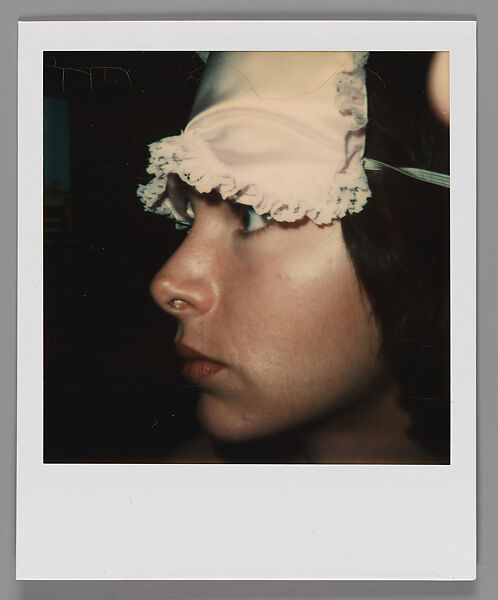 [Joyce Baronio Wearing Sleep Mask], Walker Evans (American, St. Louis, Missouri 1903–1975 New Haven, Connecticut), Instant internal dye diffusion transfer print (Polaroid SX-70) 