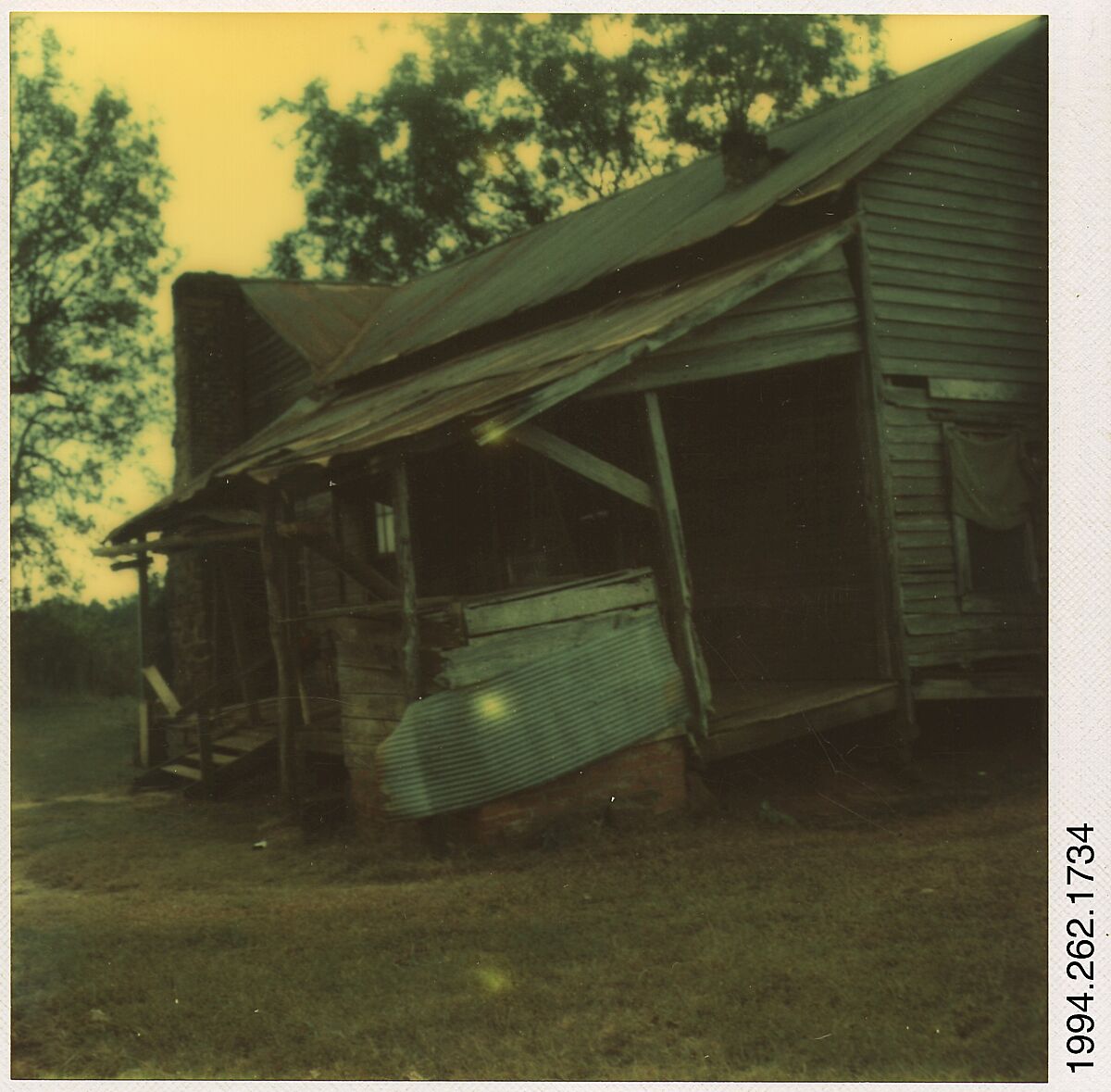 [Decaying Wooden Cabin, Hale County, Alabama], Walker Evans (American, St. Louis, Missouri 1903–1975 New Haven, Connecticut), Instant internal dye diffusion transfer print (Polaroid SX-70) 