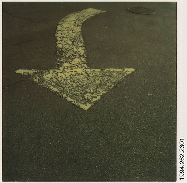 [Street Arrow and Manhole Cover], Walker Evans (American, St. Louis, Missouri 1903–1975 New Haven, Connecticut), Instant internal dye diffusion transfer print (Polaroid SX-70) 