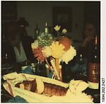 [Walker Evans Dinner Party: W.E. and Unidentified Woman with Dinner Table Centerpiece in Foreground, Old Lyme, Connecticut], Unknown, Instant internal dye diffusion transfer print (Polaroid SX-70)