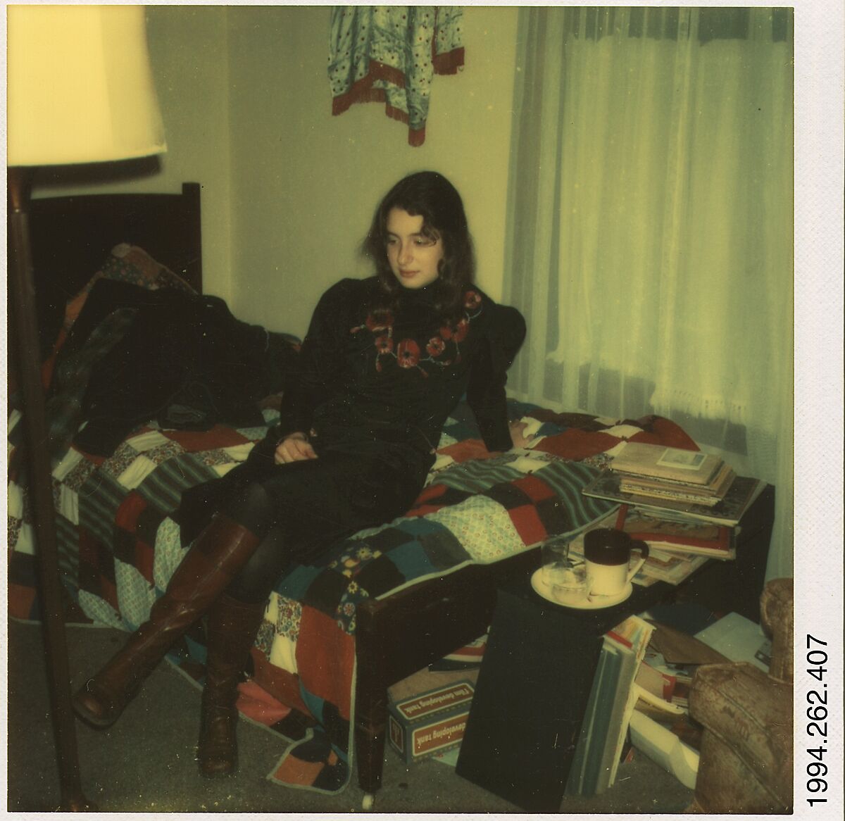 [Carla Steiger Seated on Her Bed, Oberlin, Ohio], Walker Evans (American, St. Louis, Missouri 1903–1975 New Haven, Connecticut), Instant internal dye diffusion transfer print (Polaroid SX-70) 