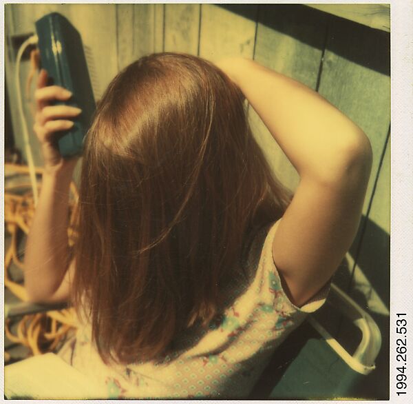 [Gay Burke Brushing Her Hair, Old Lyme, CT], Walker Evans (American, St. Louis, Missouri 1903–1975 New Haven, Connecticut), Instant internal dye diffusion transfer print (Polaroid SX-70) 