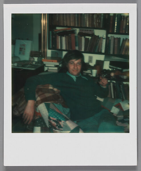[Keith Godard in Walker Evans's Library, Old Lyme, Connecticut], Walker Evans (American, St. Louis, Missouri 1903–1975 New Haven, Connecticut), Instant internal dye diffusion transfer print (Polaroid SX-70) 