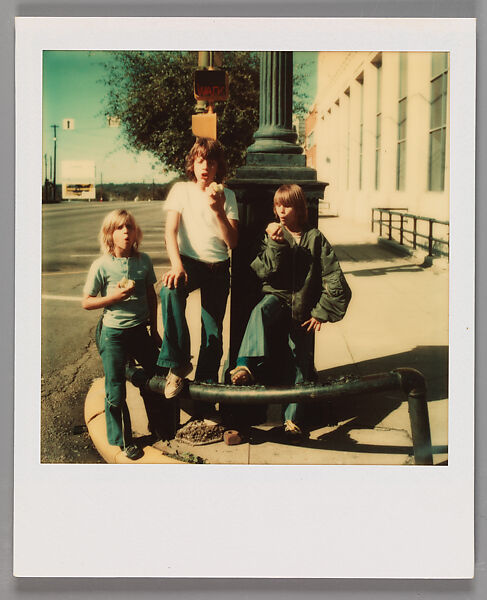 [Three Boys Eating Apples On Street Corner], Walker Evans (American, St. Louis, Missouri 1903–1975 New Haven, Connecticut), Instant internal dye diffusion transfer print (Polaroid SX-70) 