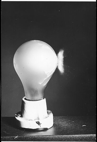 [Bullet Hitting Light Bulb], Harold Edgerton (American, 1903–1990), Gelatin silver print 