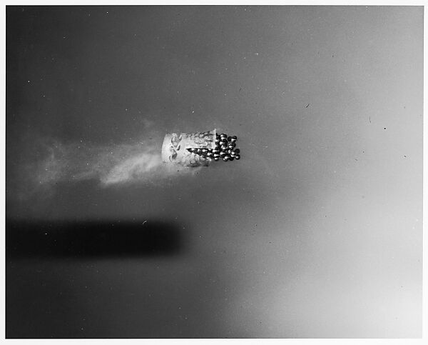 [Pellets Fired From Shotgun Still Partially Within Casing], Harold Edgerton (American, 1903–1990), Gelatin silver print 