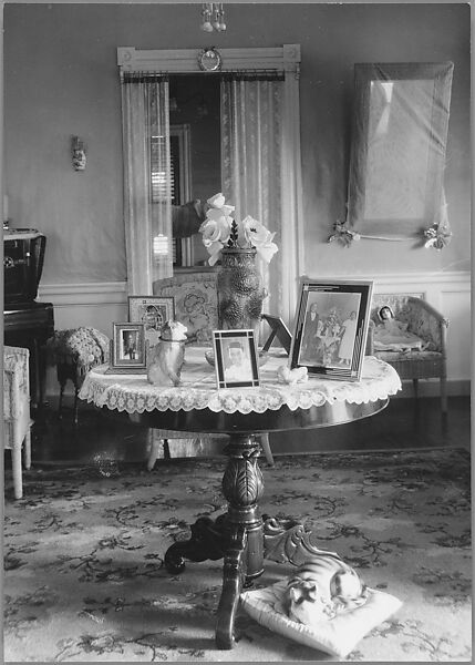 [Domestic Interior with Framed Photographs on Round Table], Nancy Naumburg (American), Gelatin silver print 