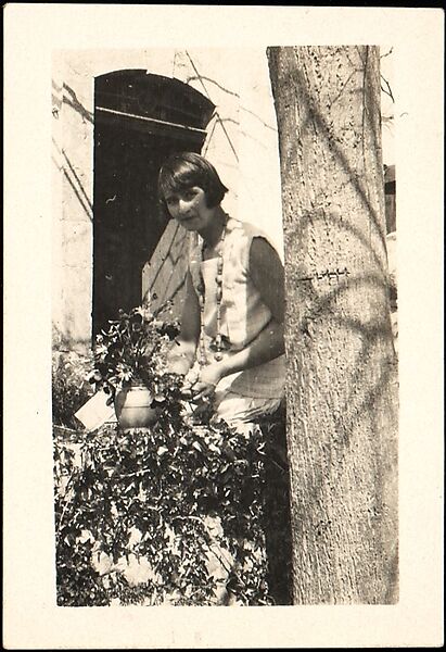 [Georgette Maury Standing in Garden with Potted Plant, Les Cyprés de St. Jean par Grasse, France], Walker Evans (American, St. Louis, Missouri 1903–1975 New Haven, Connecticut), Gelatin silver print 