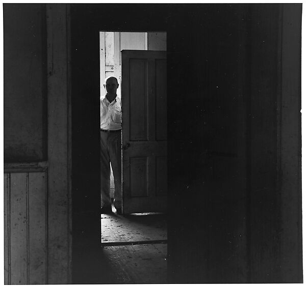 [Man Standing in Doorway Looking Into Darkened Room], Ralph Eugene Meatyard (American, 1925–1972), Gelatin silver print 