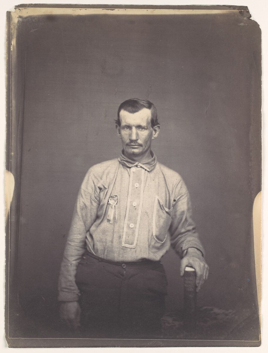 [Man Holding Patent Office Book], Attributed to Oliver H. Willard (American, active 1850s–70s, died 1875), Salted paper print from glass negative 
