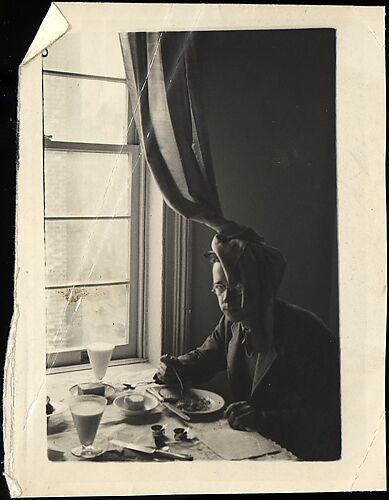 [Walker Evans Seated at Breakfast Table, Curtain Draped on Head, New York City]