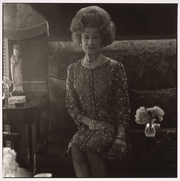 Mrs. T. Charlton Henry on a couch in her Chestnut Hill home, Philadelphia, Pa.