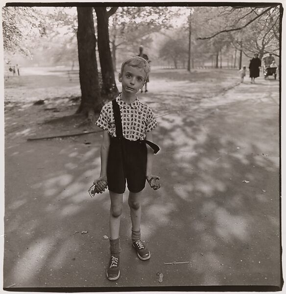 Child with a toy hand grenade in Central Park, N.Y.C.