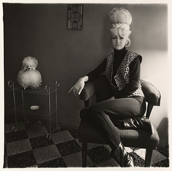Lady bartender at home with a souvenir dog, New Orleans, Diane Arbus (American, New York 1923–1971 New York), Gelatin silver print 