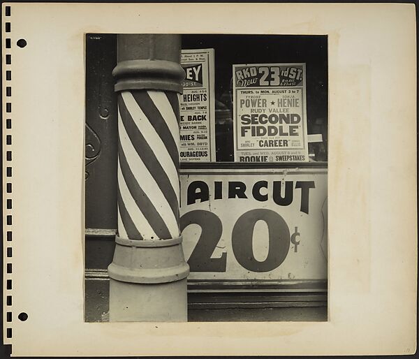 [Barber Shop Facade Detail with Pole in Foreground and Movie House Posters in Window, New York City], Rudy Burckhardt (American (born Switzerland), Basel 1914–1999 Searsmont, Maine), Gelatin silver print 