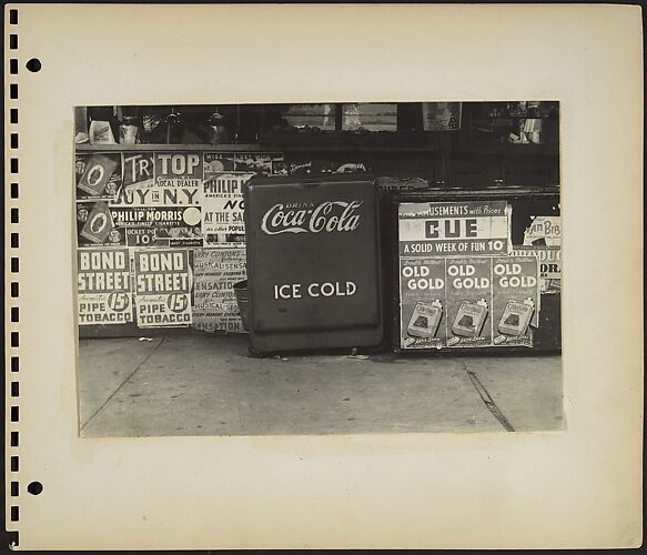 [Torn Posters on Storefront Facade and Sidewalk Ice Cream and Soda Coolers, New York City]