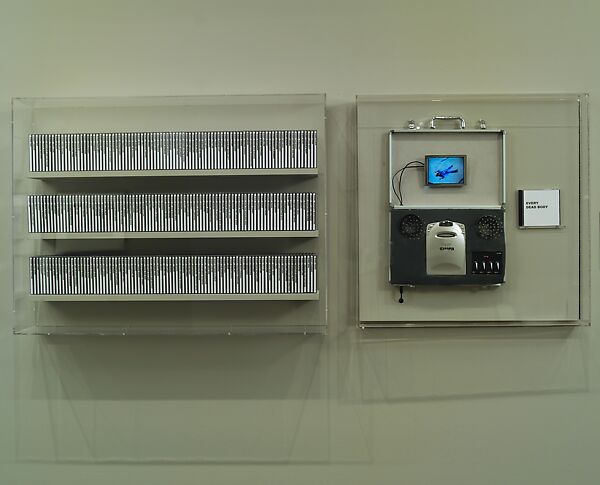 Every Shot, Every Episode, Jennifer and Kevin McCoy (American, born 1968 and 1967), Custom digital video playback installation with 277 video compact discs