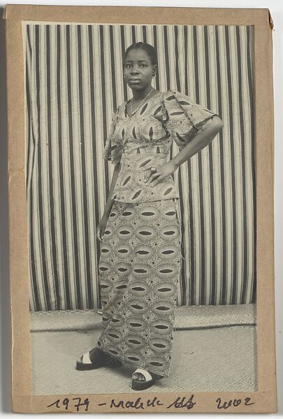 [Woman Standing Before Striped Background], Malick Sidibé (Malian, Soloba 1936–2016 Bamako), Gelatin silver print 