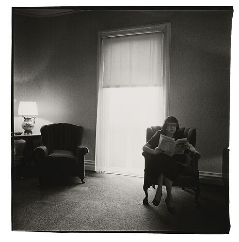 Lady in a rooming house parlor, Albion, N.Y.
