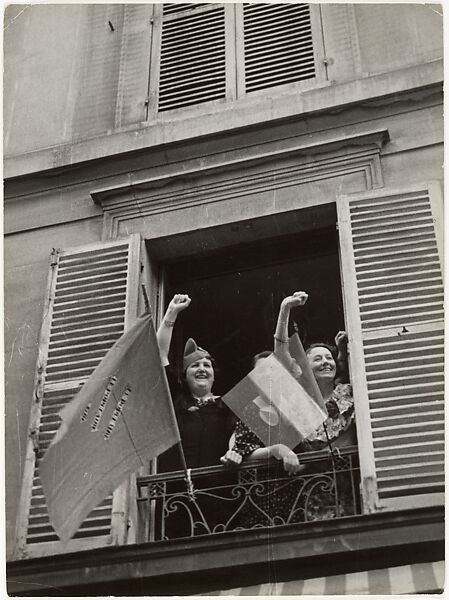 [Women Giving Popular Front Salute from Window, Bastille Day, Paris], Robert Capa (American (born Hungary), Budapest 1913–1954 Thai Binh), Gelatin silver print 