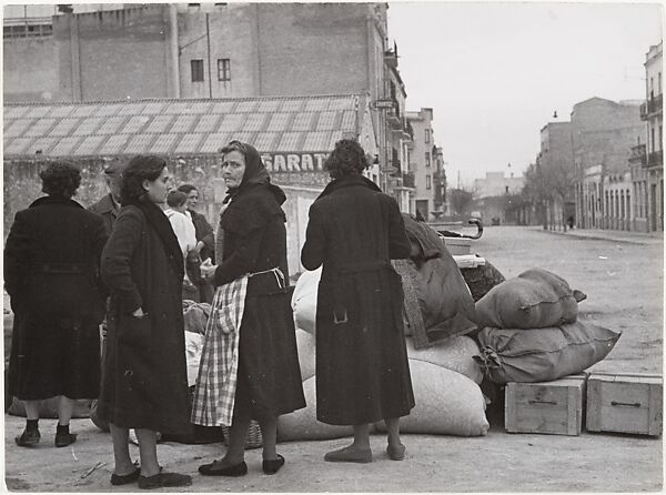 [Spanish Women in Street with Sacks and Boxes], Robert Capa (American (born Hungary), Budapest 1913–1954 Thai Binh), Gelatin silver print 