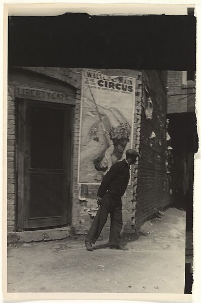 [Man in Front of Doorway of Liberty Cafe, with Walter L. Main Circus Poster on Wall], Peter Sekaer (American (born Denmark), Copenhagen 1901–1950 Ardsley, New York), Gelatin silver print 