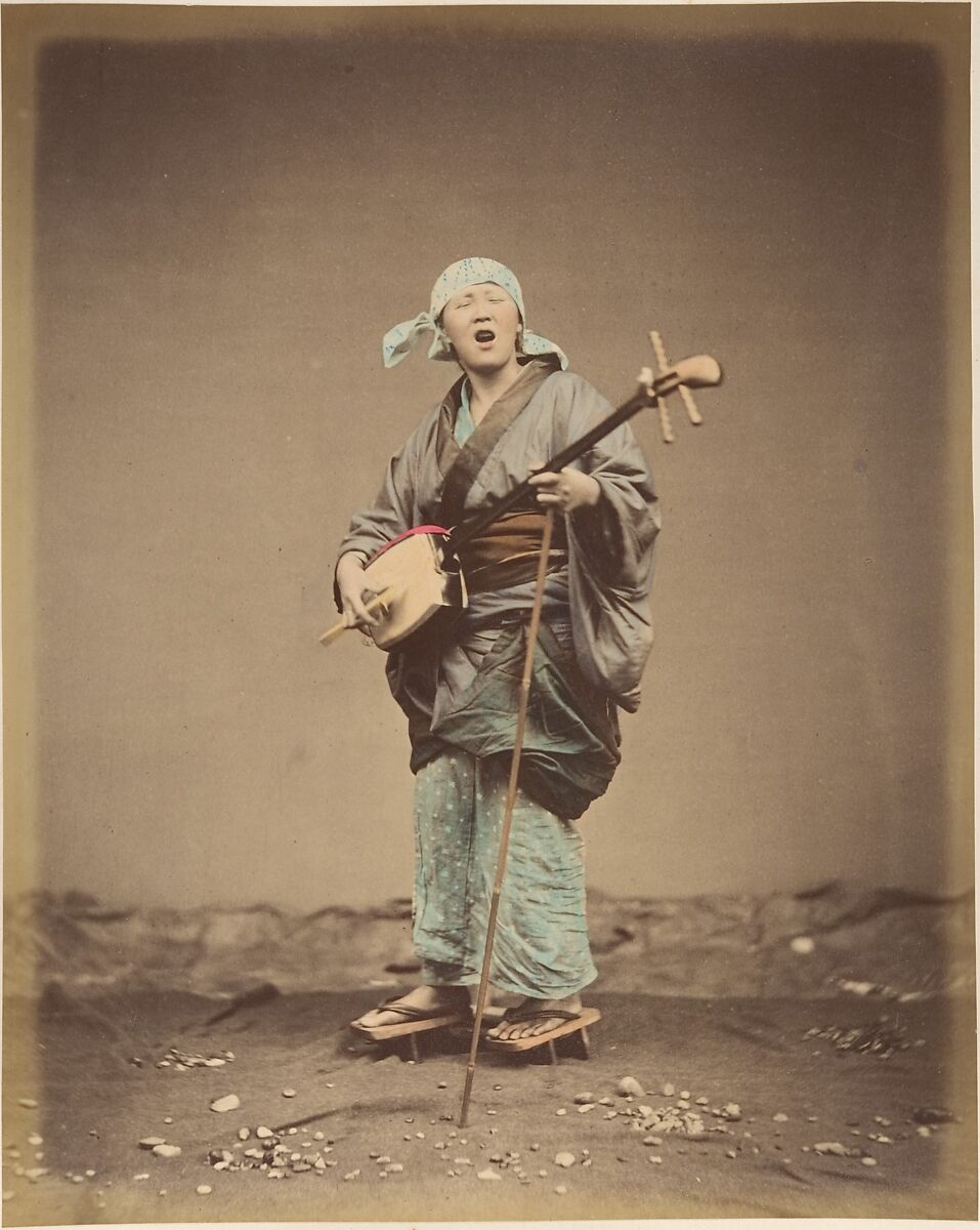 Street Minstrel, Gose, Suzuki Shin&#39;ichi (Japanese, 1835–1919), Albumen silver print from glass negative with applied color 