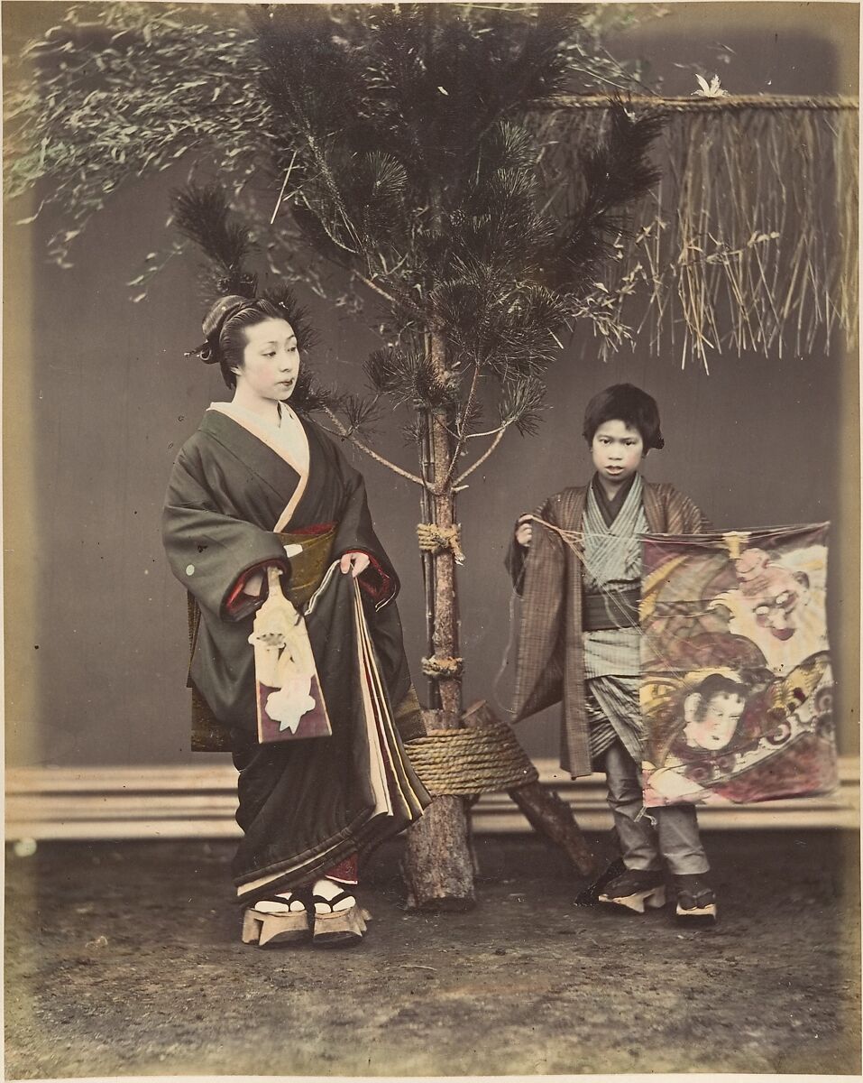[A Japanese Woman and a Japanese Boy in Traditional Dress], Suzuki Shin&#39;ichi (Japanese, 1835–1919), Albumen silver print from glass negative with applied color 