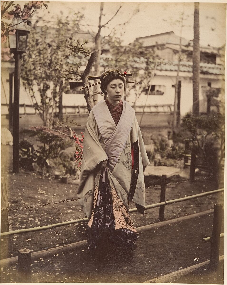 [Japanese Woman in Traditional Dress Posing Outdoors], Suzuki Shin&#39;ichi (Japanese, 1835–1919), Albumen silver print from glass negative with applied color 