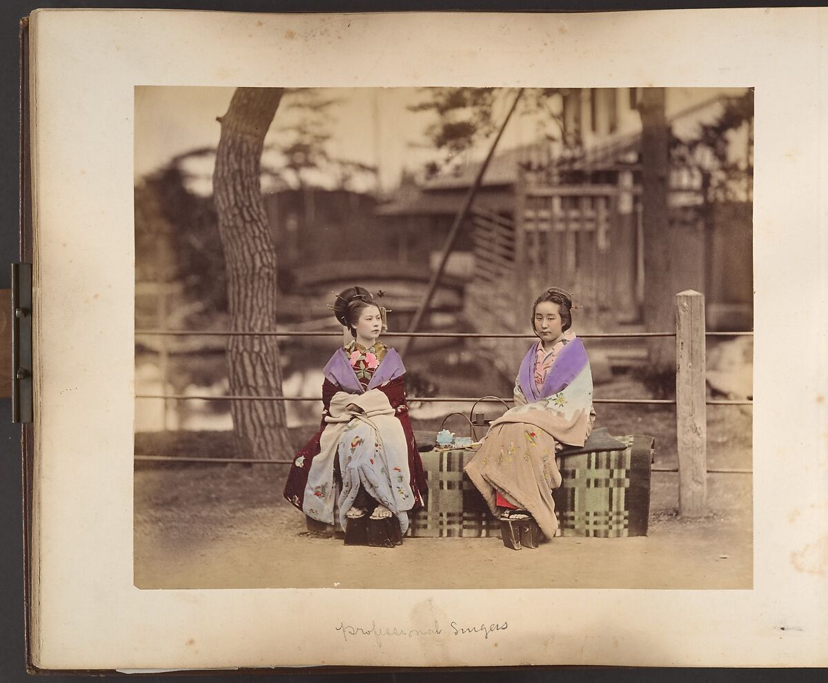 [Two Japanese Women Sitting on a Bench], Unknown, Albumen silver print from glass negative with applied color 