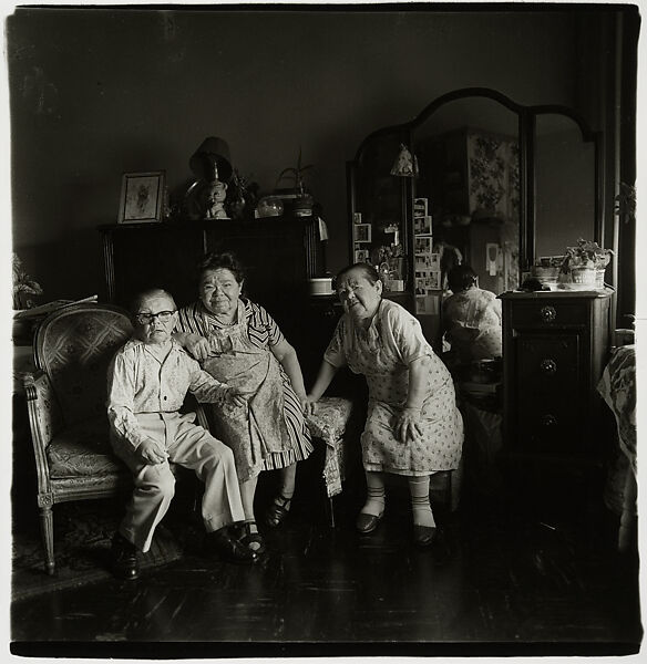 Russian midget friends in a living room on 100th Street, N.Y.C.