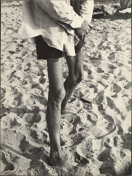 [Beach Scene: Man with Light Shirt and Dark Shorts, Coney Island, New York], Leon Levinstein (American, Buckhannon, West Virginia 1910–1988 New York), Gelatin silver print 