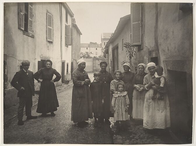 [Group of Adults and Children on a Village Street in the Auvergne]