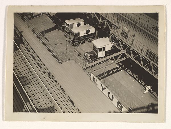 [New York Album: Trucks Below 14th Street and 9th Avenue Elevated Train Station]