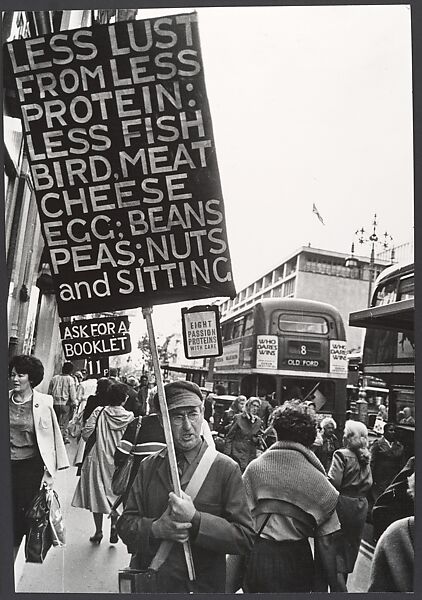 [Man on Busy Street Holding Advertising Placard, London], Leon Levinstein (American, Buckhannon, West Virginia 1910–1988 New York), Gelatin silver print 