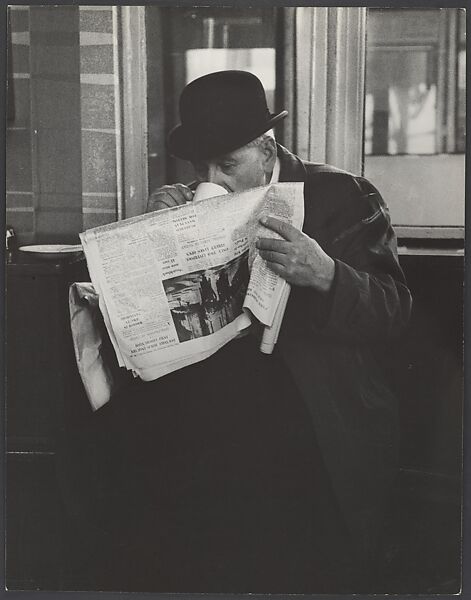 [Man in Bowler Hat Reading Newspaper and Drinking Tea, London], Leon Levinstein (American, Buckhannon, West Virginia 1910–1988 New York), Gelatin silver print 