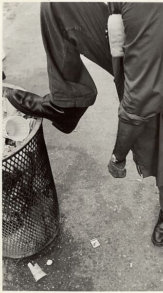 [Street Scene: Man Resting Foot on Lip of Trashcan, New York City], Leon Levinstein (American, Buckhannon, West Virginia 1910–1988 New York), Gelatin silver print