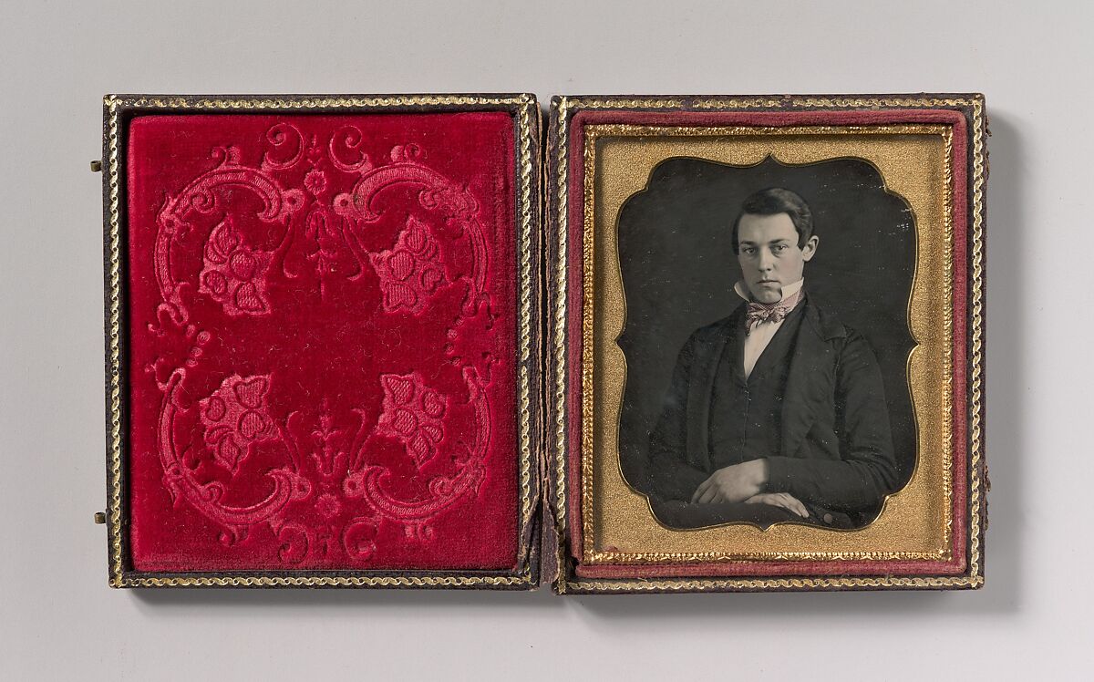 [Young Man with Up-turned Collar and Bow Tie], Unknown (American), Daguerreotype with applied color 