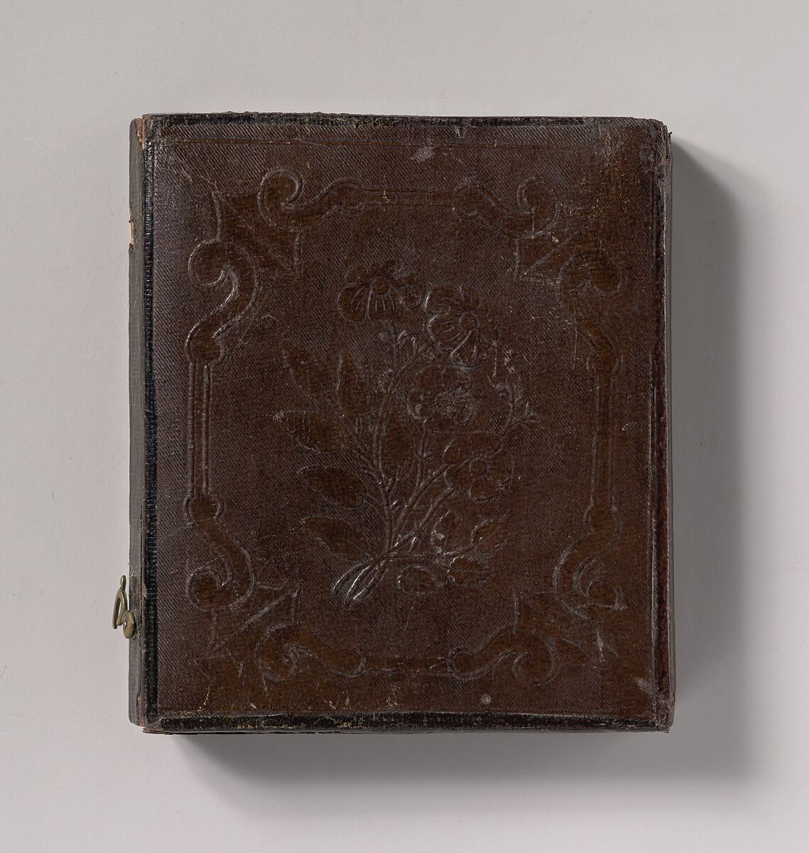 [Postmortem Baby, Partially Covered by a Flowered Shawl with a Fringe Hem], Unknown (American), Daguerreotype