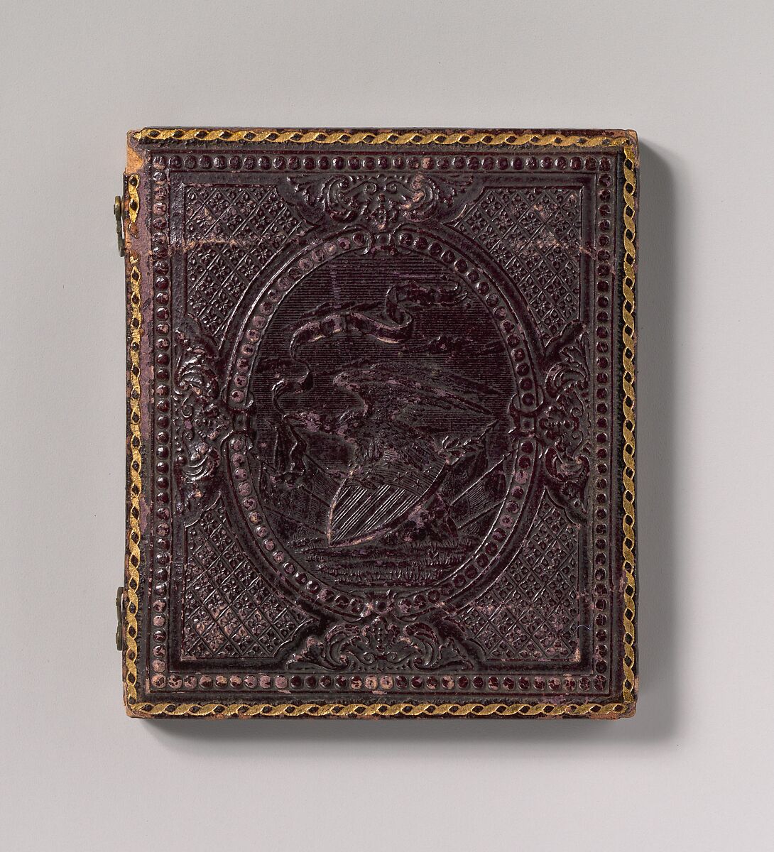 [Seated Young Woman Wearing a Shawl, Holding an Open Book in her Lap], Unknown (American), Daguerreotype with applied color