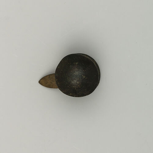 Button, maybe for a Horse Tack