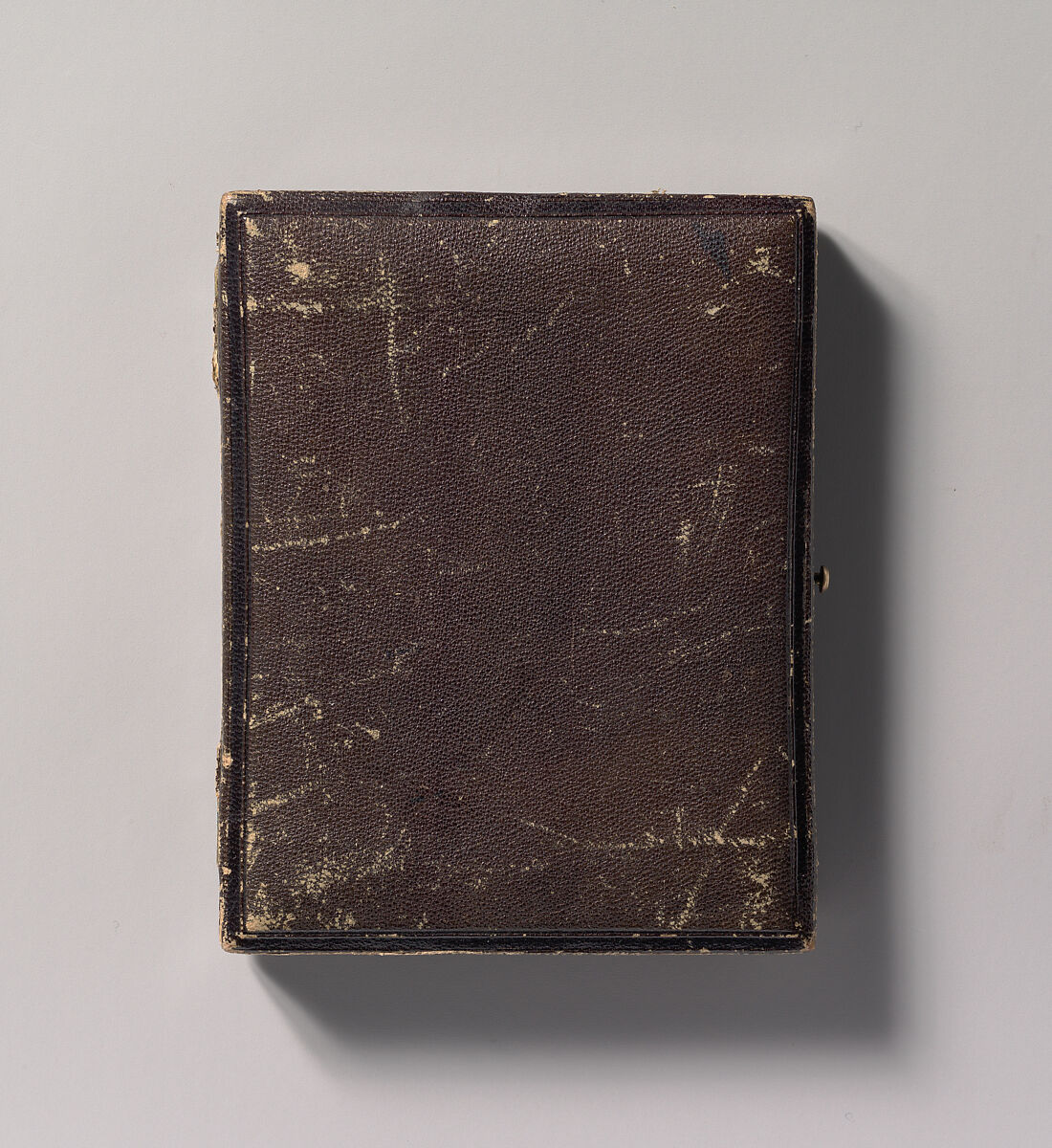 [Stereoscopic Case, Partially Nude Strongman Holding Indian Clubs], Unknown (American), Daguerreotype with applied color