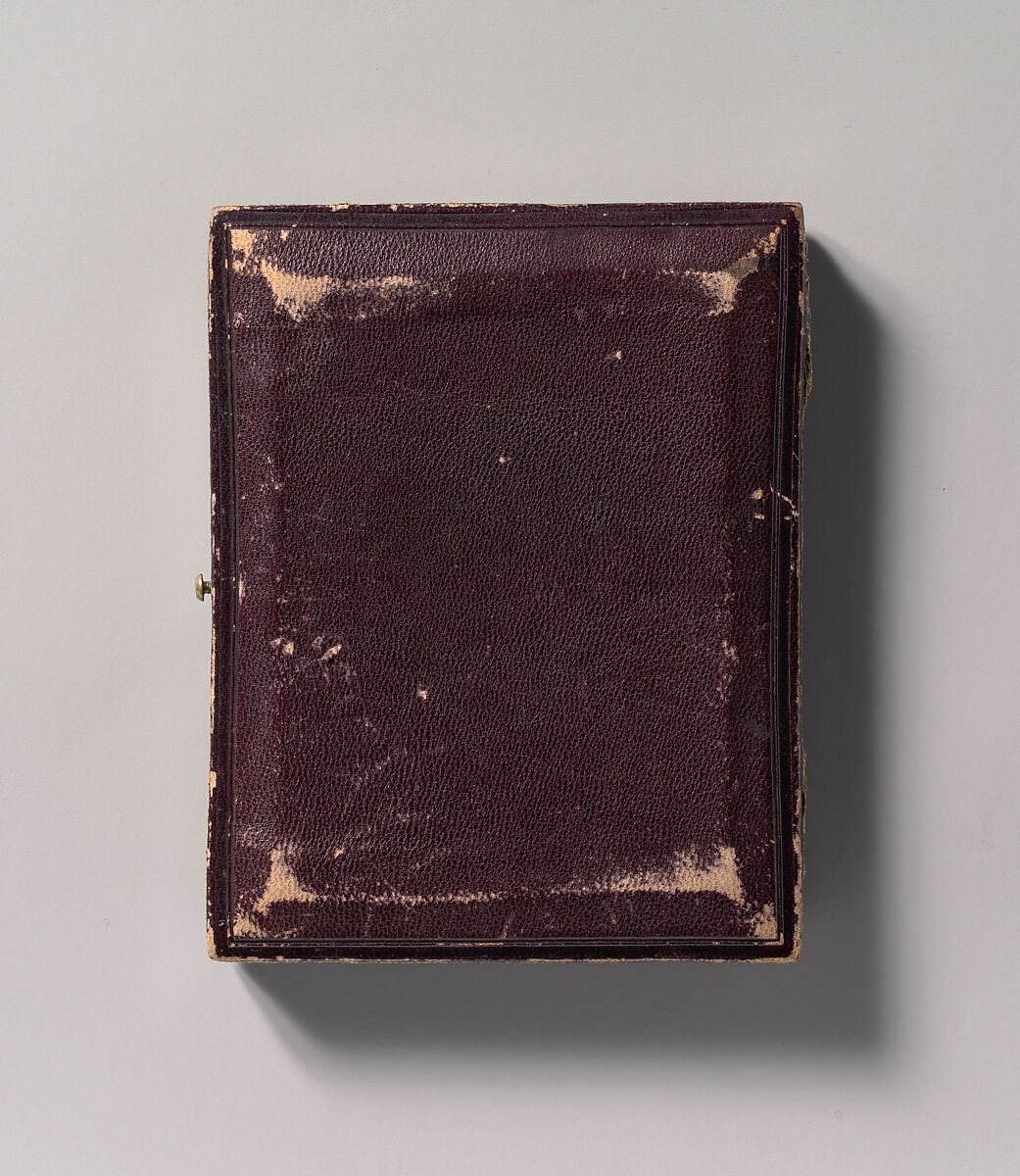 [Stereoscopic Case, Partially Nude Strongman Holding Indian Clubs], Unknown (American), Daguerreotype with applied color