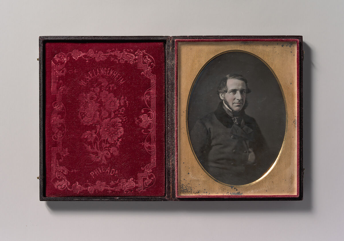[Middle-aged Man with Chinstrap Beard, Hand Tucked Inside Buttoned Jacket], W. &amp; F. Langenheim (American, active 1843–1874), Daguerreotype with applied color 