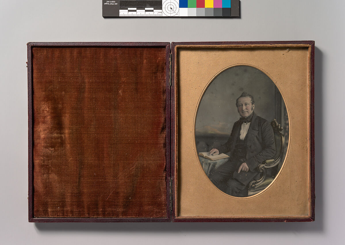 [Seated Man Pointing to a Passage in an Open Book], John Jabez Edwin Mayall (British, Oldham, Lancashire 1813–1901 West Sussex), Daguerreotype with applied color 