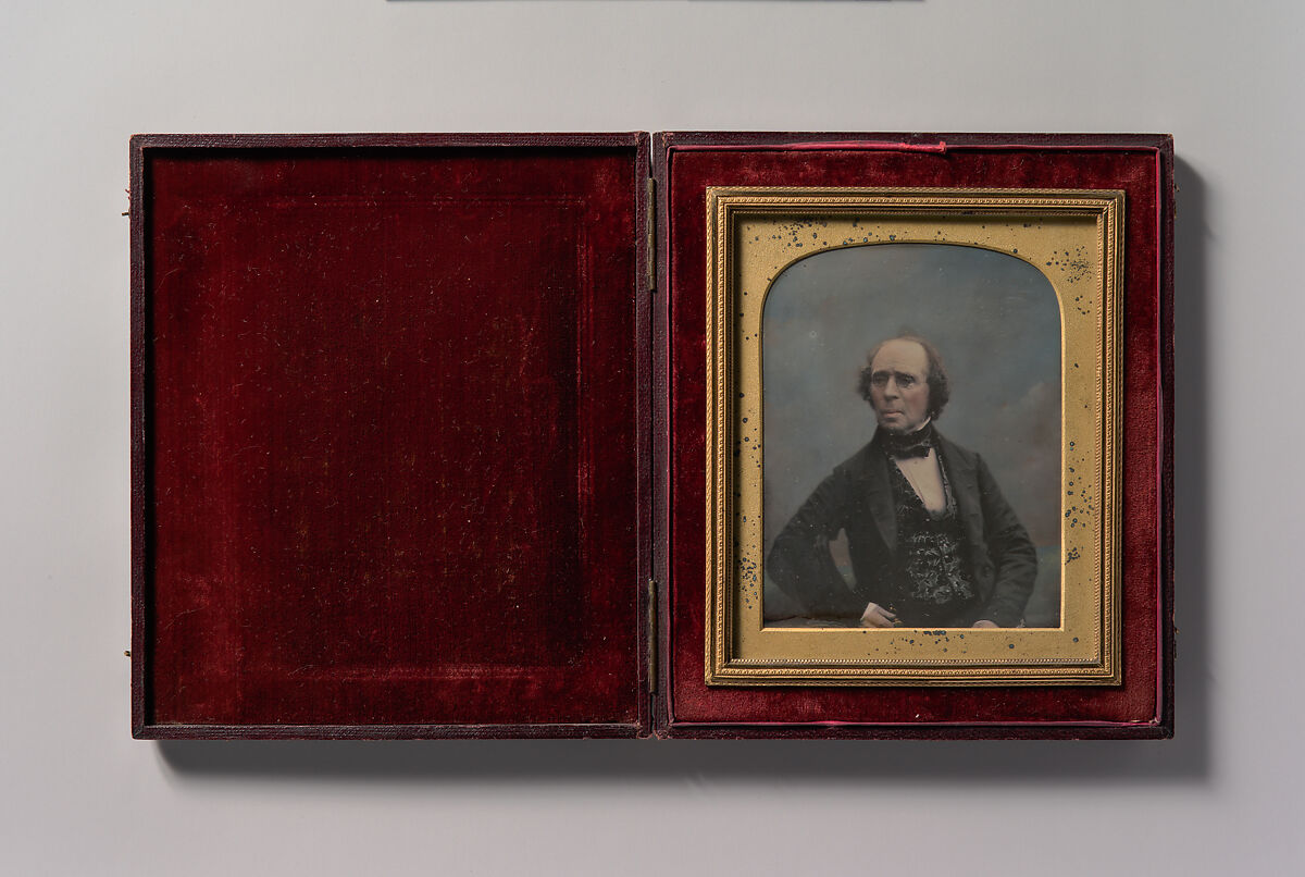 [Middle-aged Man with Glasses Holding Pocket Watch], Antoine-François-Jean Claudet (French, Lyon 1797–1867London), Daguerreotype with applied color 