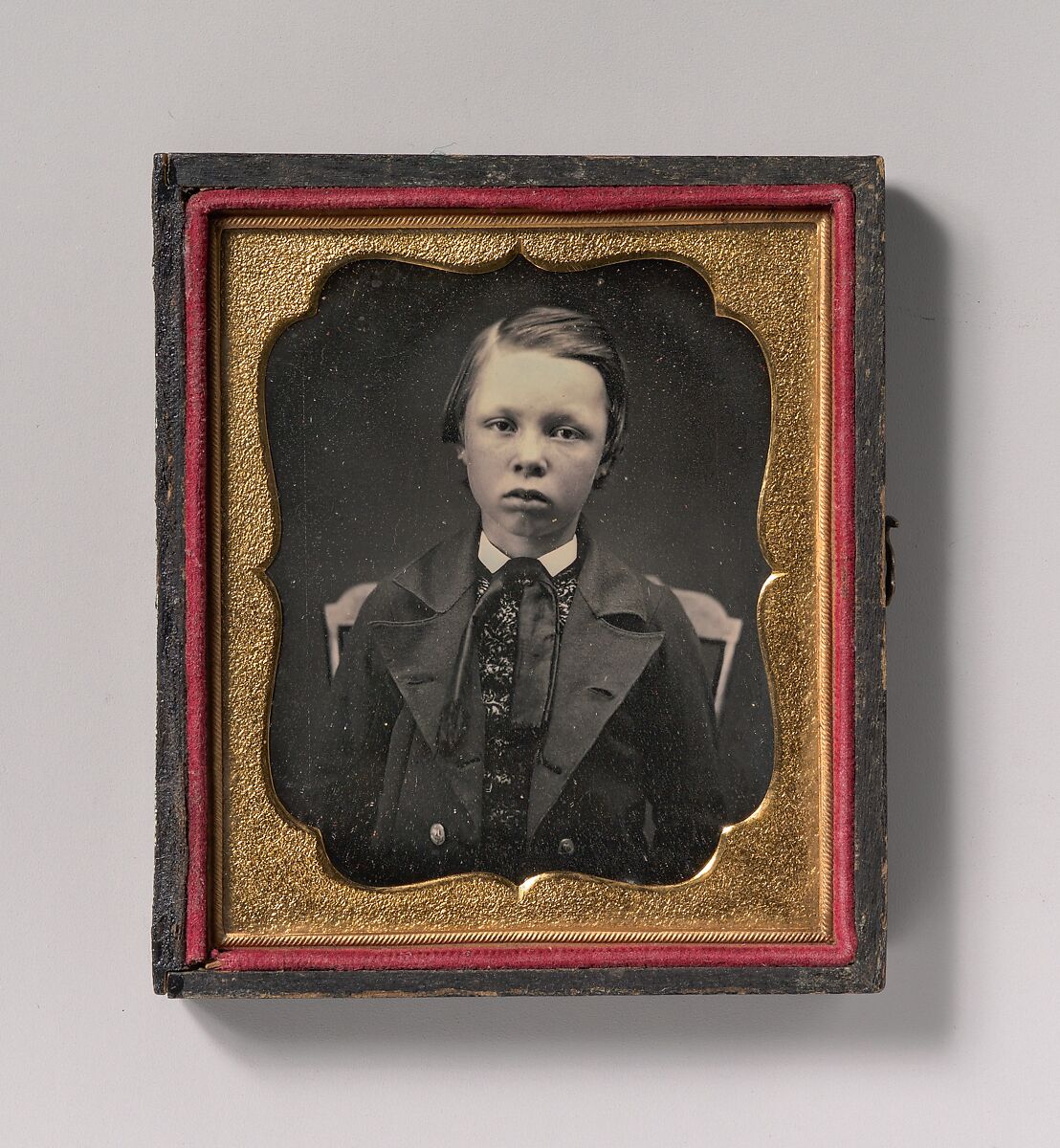 [Boy in Wide Lapelled Coat, Seated in Chair], Unknown (American), Daguerreotype 