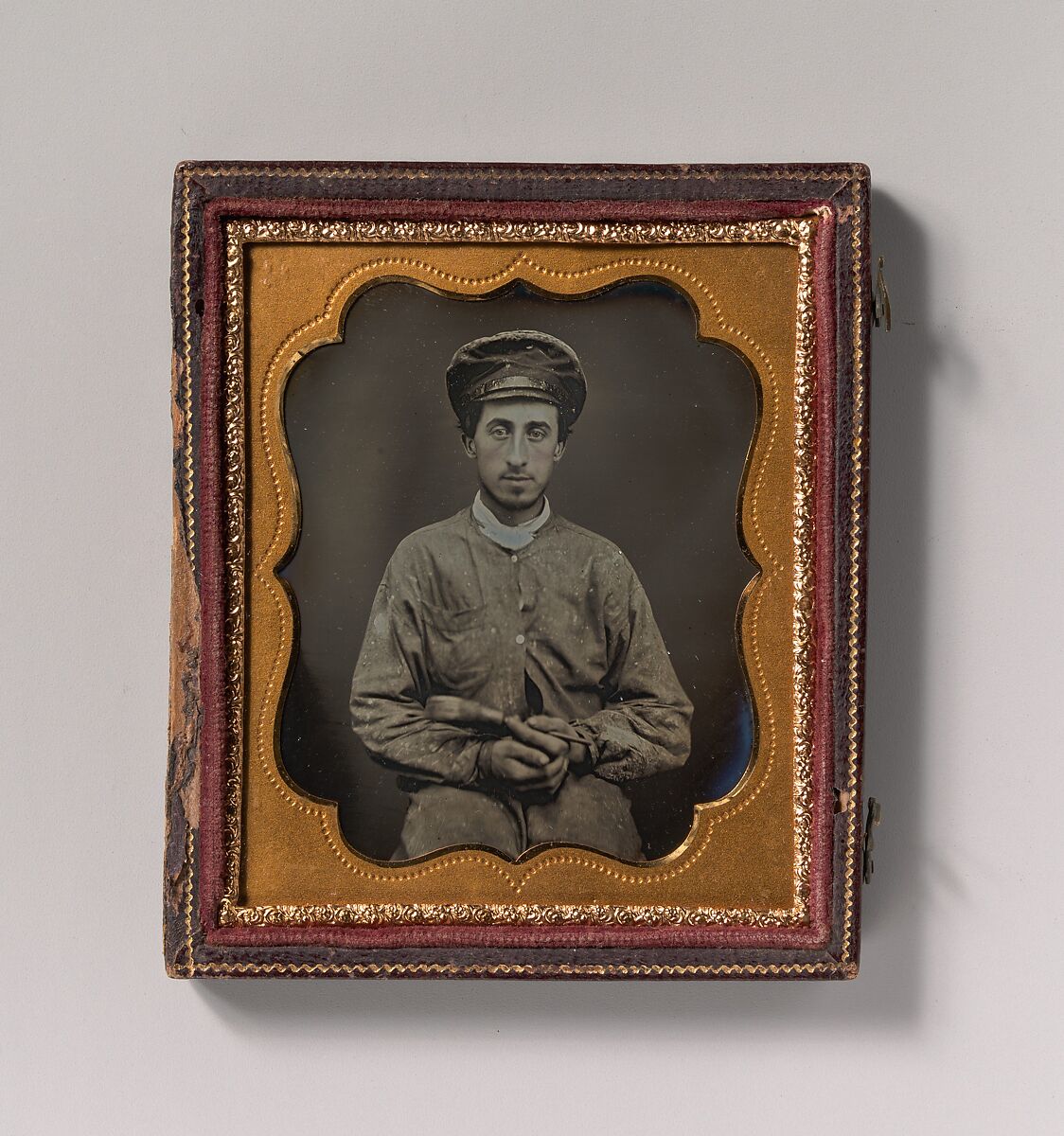 [House Painter Wearing a Cap and Holding a Paint Brush], Unknown (American), Daguerreotype with applied color 