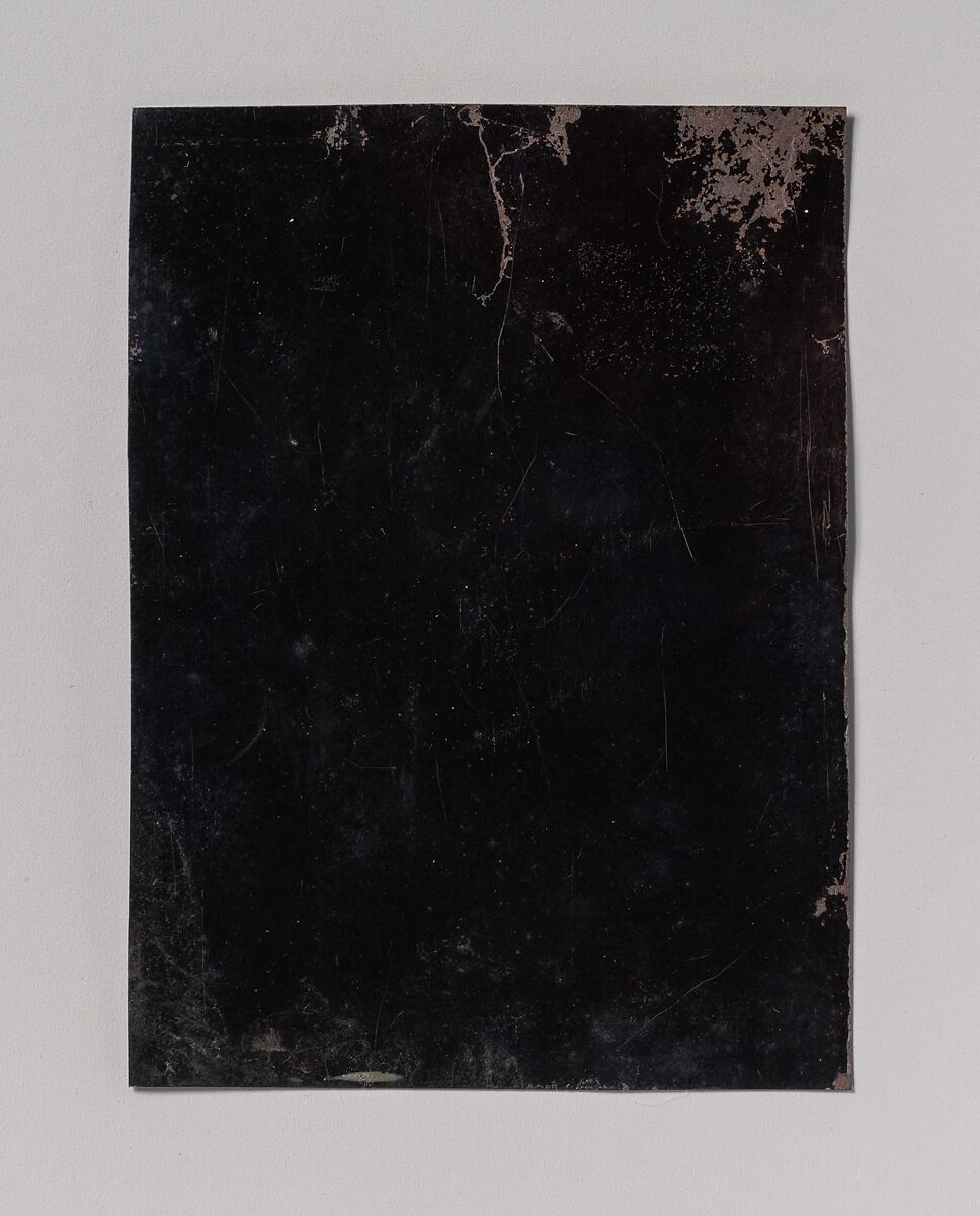 [Carpenter Sawing a Plank of Wood], Unknown (American), Tintype with applied color