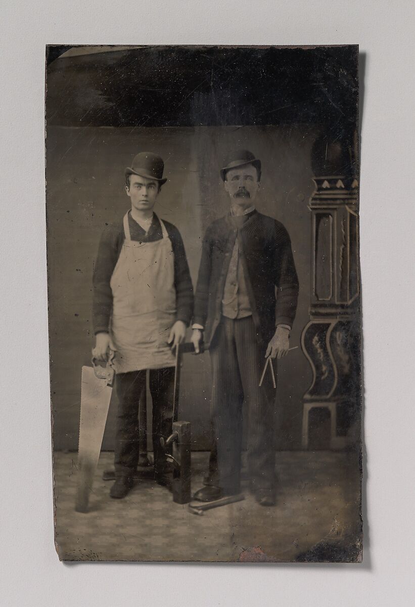 [Two Carpenters with a Handsaw, Wood Plane, Hammer, Compass, and Square], Unknown (American), Tintype 
